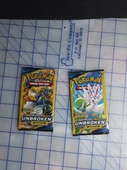 Pokemon 3 Card Booster Lot 45 - Minds, Celestial, Bonds, Sword, Sun + 3 Binders - Image 4