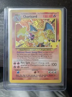 Near mint Holographic Celebrations Charizard-4/102 Pokemon Collectible Card - Image 1