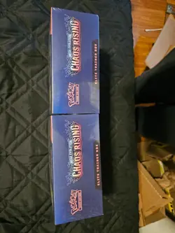 Pokemon TCG: Chaos Rising ETB Factory Sealed In hand - Image 2