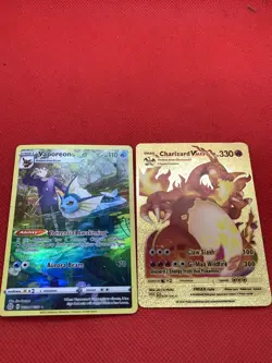 2 Pokemon cards - Vaporeon & Charizard Vmax - Image 1