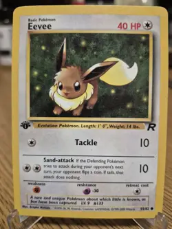 POKEMON EEVEE 55/82 1ST EDITION TEAM ROCKET LP - Image 1