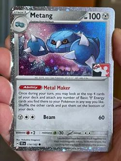 POKEMON METANG 114/162 COMMON COSMOS HOLO WITH SWIRL PLAY! PRIZE PROMO NM CARD - Image 1