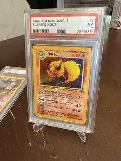 1999 POKEMON JUNGLE #3 FLAREON-HOLO PSA 7 - Image 1
