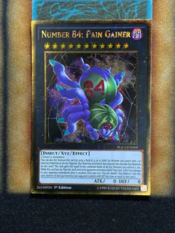 Yugioh Number 84: Pain Gainer PGL3-EN010 Gold Secret Rare 1st Ed NM - Image 1
