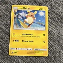 The Pokemon Company Alolan Raichu SM65 110 Regular English promo box and figure - Image 1