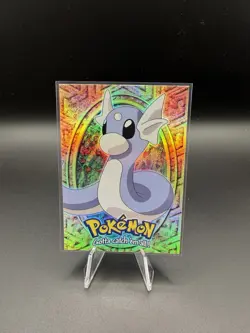 1999 Topps Pokemon the First Movie E10 #147 Dratini Rainbow Foil Blue Logo Holo - Image 1