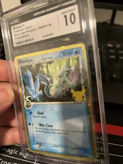 Pokemon TCG Mimikyu SWSH136 Delta Species Celebrations Black Star Promo Holo - Image 3