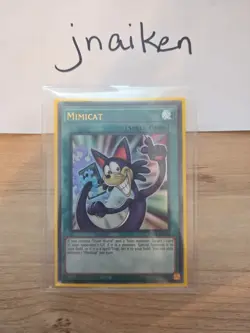 Yugioh Mimicat DLCS-EN078 Ultra Rare 1st Edition NM/M - Image 1