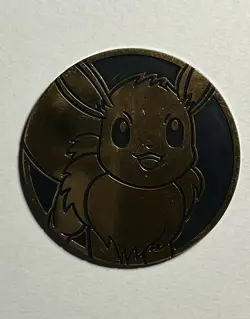 Pokemon TCG Eevee Gold Mirror Jumbo Coin (NM) S&V: Prismatic Evolutions 2025 - Image 1