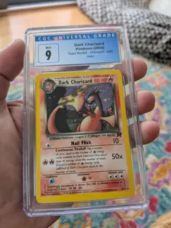CGC 9 MINT Pokemon Team Rocket Holo Dark Charizard 4/82 SWIRL 2000 Unlimited - Image 1