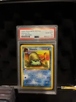 Pokemon Fossil Omanyte 52/62 1st Edition PSA 10 1999 English TCG - Image 1