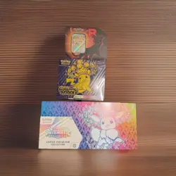 Pokemon TCG Sealed Lot Prismatic Super + Surging Sparks ETB + Team Rocket Tin - Image 1