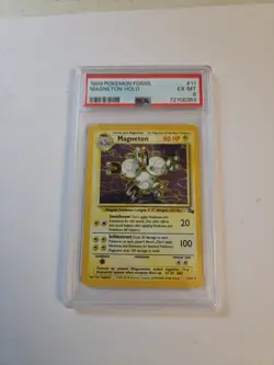 1999 POKEMON FOSSIL MAGNETON HOLO #11 PSA 6 - Image 1