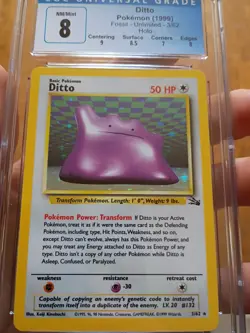 CGC 8 Ditto Pokemon Fossil Unlimited Holo 3/62 - Image 1