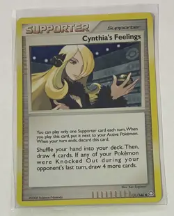Cynthia's Feelings 131/146 | Cosmos Holo | Pokemon Legends Awakened | LP - Image 1