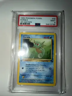 1999 POKEMON FOSSIL 1ST EDITION #49 HORSEA PSA 9 - Image 1