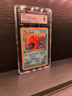 Graded Pokemon Card Kingler Pokemon (1999) Fossil - 1st Edition - 38/62 - Image 1
