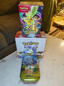 Pokemon Ascended Heroes Booster Bundle + Mini Tin + Surging Sparks Booster Box - Image 1