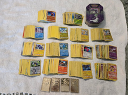 HUGE LOT OF OVER 1400 POKEMON CARDS GOLD BARS AND SEALED TIN FOIL CARDS INCLUDED - Image 1