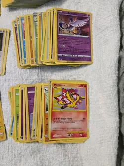 HUGE LOT OF OVER 1400 POKEMON CARDS GOLD BARS AND SEALED TIN FOIL CARDS INCLUDED - Image 2