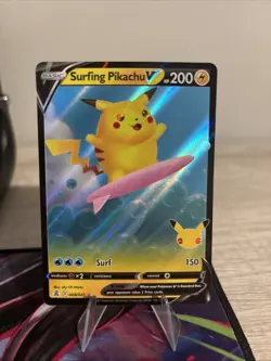 Pokemon TCG Surfing Pikachu V 008/025 Celebrations NM - Image 1