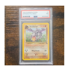 Wizards of the Coast 1999 Pokemon Fossil Aerodactyl Holo 1/62 PSA 7 Unlimited - Image 1
