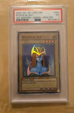2002 Yu-Gi-Oh! LOB-062 Mystical Elf - 1st Edition Asian-English PSA 7 Blue Eyes - Image 1