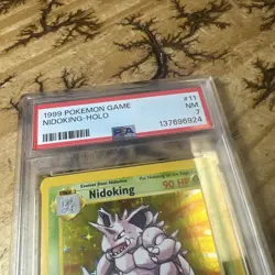 1999 POKEMON GAME #11 NIDOKING-HOLO PSA 7 - Image 2