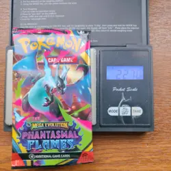 Pokemon Tcg Mega Evolution phantasmal flames Heavy 22.70g Booster Pack Sealed - Image 1