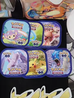 Pokemon TCG Miscellaneous Lot! TCG Metal Coin, Magnets Stickers Go Charizard Tin - Image 3
