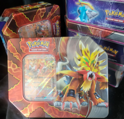 Pokemon Trading Card Game / Paradox Destinies Tin featuring Gouging Fire - Image 1