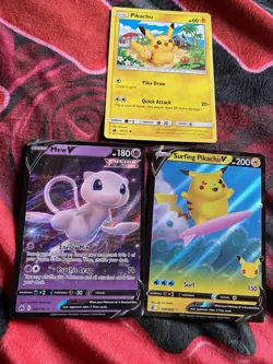 Pokemon TCG Holo Mew V Surfing Pikachu V 2017 Pikachu Card Lot - Image 1