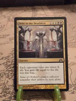 MTG Debt to the Deathless Dragon's Maze Regular Uncommon NM - Image 1
