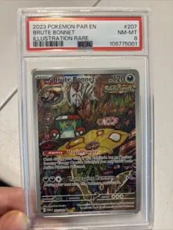2023 Pokemon Brute Bonnet Illustration Rare #207 PSA 8 - Image 1