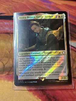 MTG Moira Brown, Guide Author (Surge Foil) [Fallout] Near Mint Foil​ - Image 1