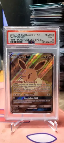 Pokemon TCG PSA 9 2019 Eevee GX SM233 Full Art Black Star Promo Holo - Image 1