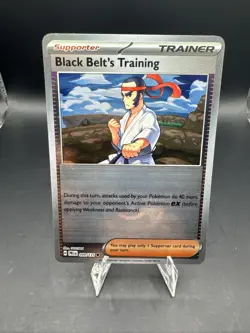 Pokeball Black Belt's Training - 099/131 Prismatic Evolutions Pokemon NM - Image 1