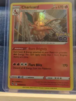 Pokemon Go Stamped Charizard 10/78 Holo Mint - Image 1