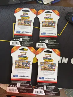 Pokemon TCG Surging Sparks Sleeved pokemon Booster Packs Sealed Lot Of 4. - Image 2