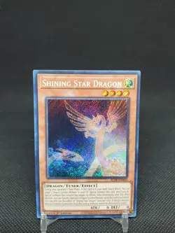 Shining Star Dragon BLTR-EN002 Secret Rare 1st Edition NM Yugioh Card - Image 1