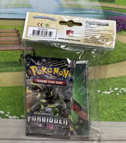 Pokemon TCG Sun & Moon Forbidden Light Booster Pack & Album - Image 2