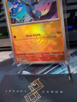 Riolu 050/131 - S&V: Prismatic Evolutions Pokeball Holo - Pokemon TCG (NM) - Image 2