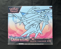 Pokemon Center Mega Evolution: Chaos Rising ETB Sealed W/ Pin Size Tear in Film - Image 1