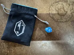 MtG Final Fantasy Die + Dice Bag - Image 1