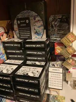 Pokemon Mystery Box! Pokemon Card Lots With 1 Graded Card And 3-8 Packs Per Box - Image 1