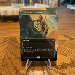 Talisman of Curiosity (Borderless) Commander: Secrets of Strixhaven Foil Magic - Image 1