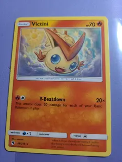 Pokemon TCG Victini Sun & Moon - Lost Thunder 49/214 Regular Rare NM - Image 1