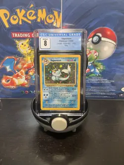 1999 Pokemon Vaporeon #12 Jungle Holo CGC 8 - Image 1