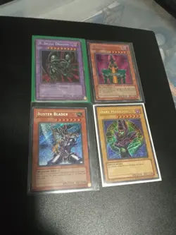 4x YuGiOh Holo BPT Lot - Dark Magician , Jinzo , B. Skull Dragon, Buster Blader - Image 1