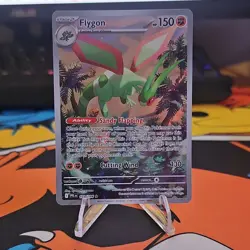 Flygon 101/094 Paldean Fates Holo Rare Stage 2 150 HP English Pokemon Card - Image 1
